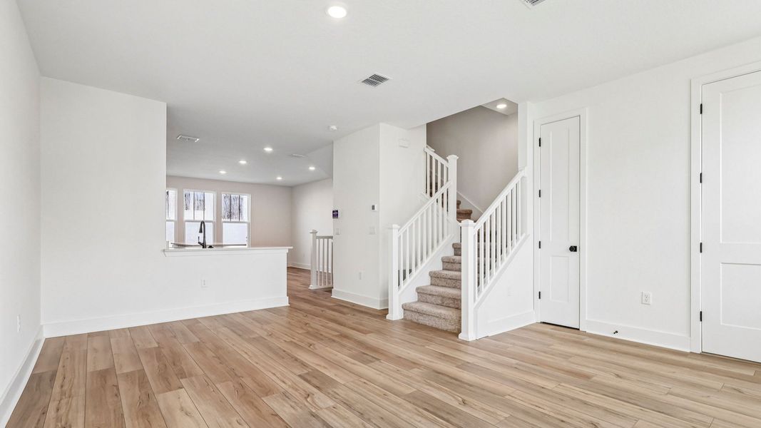 Furnished interior view inside a new home in Parkview at Hamlin, Winter Garden (Image 12).