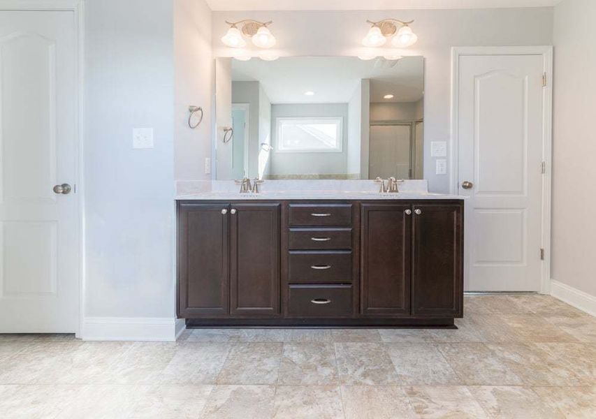 Representative furnished interior of a home built from the Aberdeen by Caviness & Cates Communities in Bartlett Manor, Youngsville (Image 51).