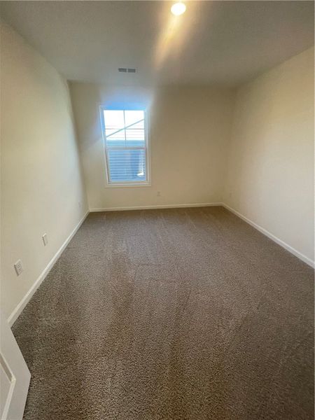 Spacious, unfurnished interior of a new home in Springwood Grove, Central (Image 35).