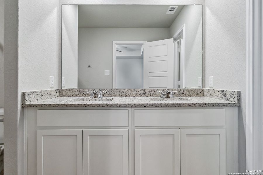 Furnished interior view inside a new home in Abbott Run, San Antonio (Image 9).