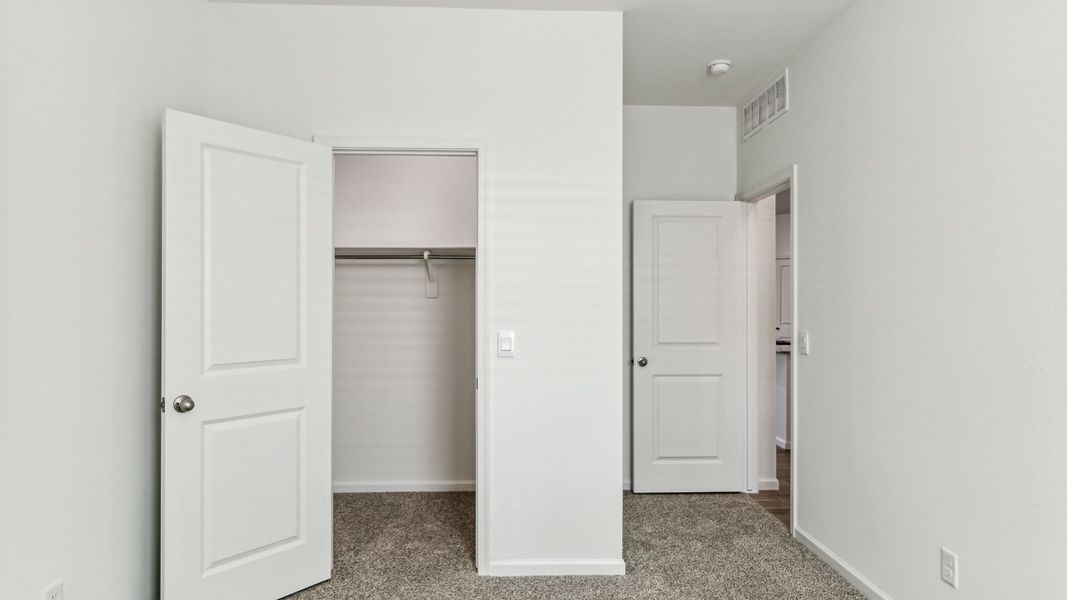 Spacious, unfurnished interior of a new home in Copper Falls, Buckeye (Image 22). Spacious, unfurnished interior of a new home in Copper Falls, Buckeye (Image 22).