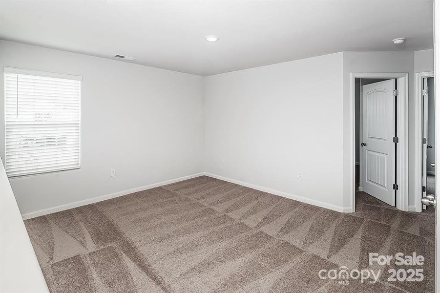 Spacious, unfurnished interior of a new home in McKee Creek Village, Charlotte (Image 10).