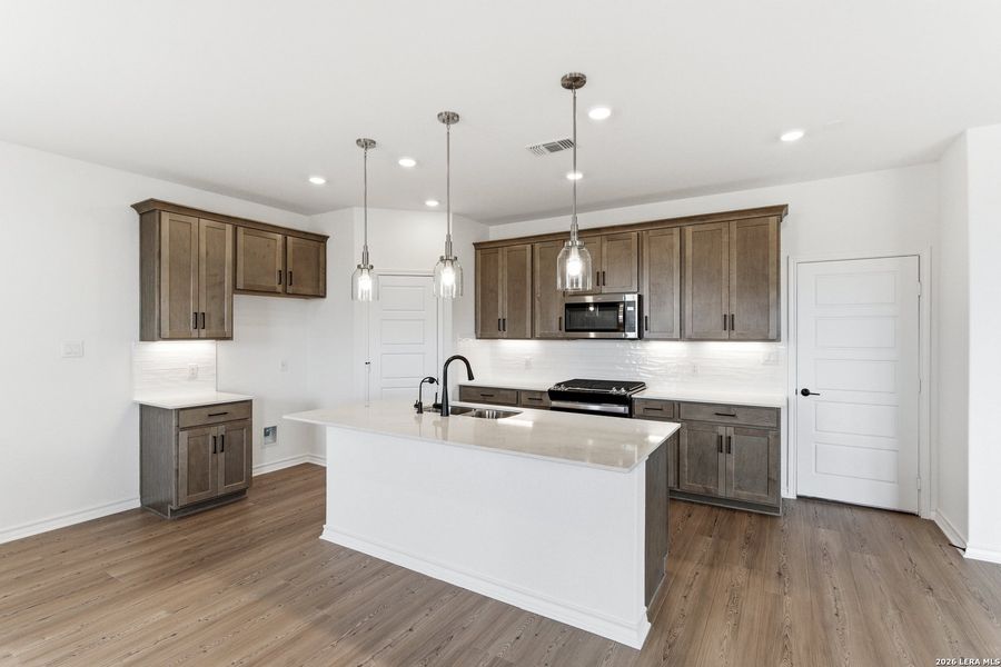 Furnished interior view inside a new home in Nopal Valley, San Antonio (Image 10).