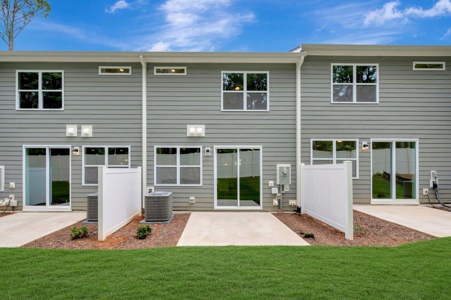 Exterior details and patio area of a home in Ashmore Townes, Garner (Image 3). Exterior details and patio area of a home in Ashmore Townes, Garner (Image 3).
