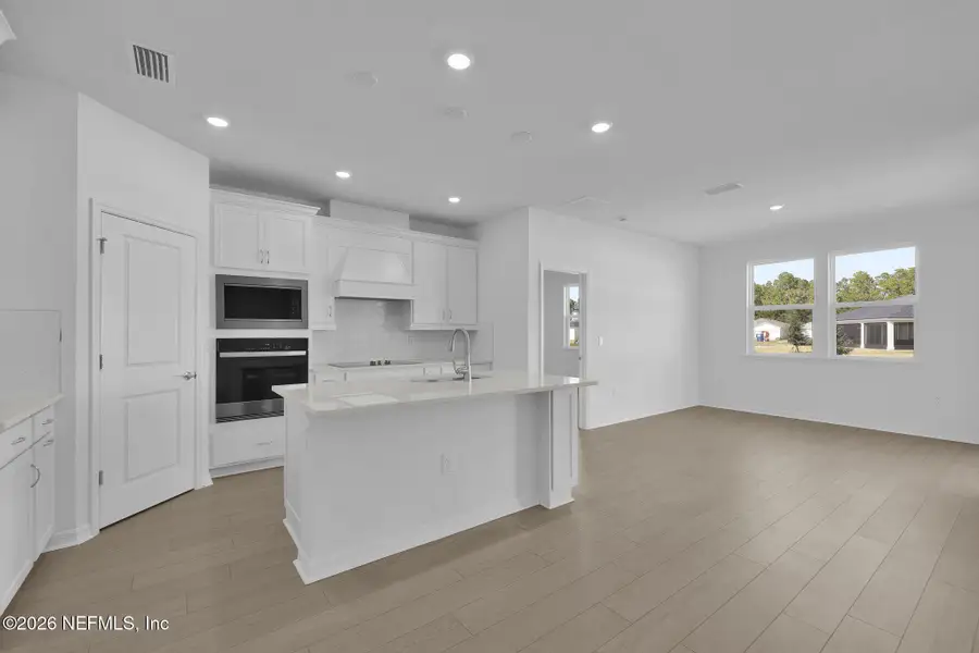 Furnished interior view inside a new home in Hyland Trail, Green Cove Springs (Image 10).