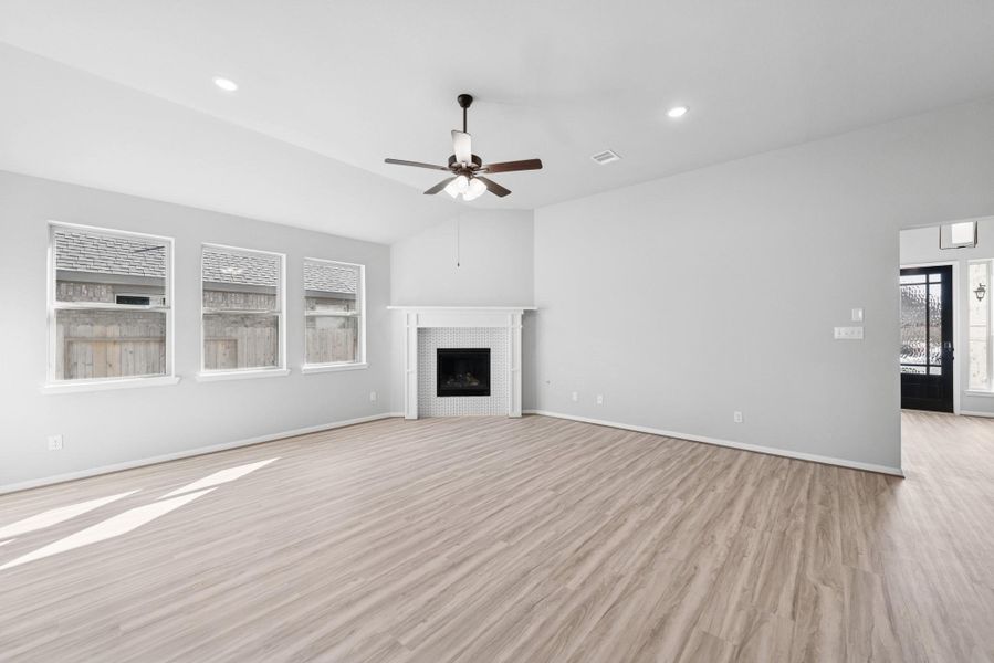 Open great room with fireplace Open great room with fireplace