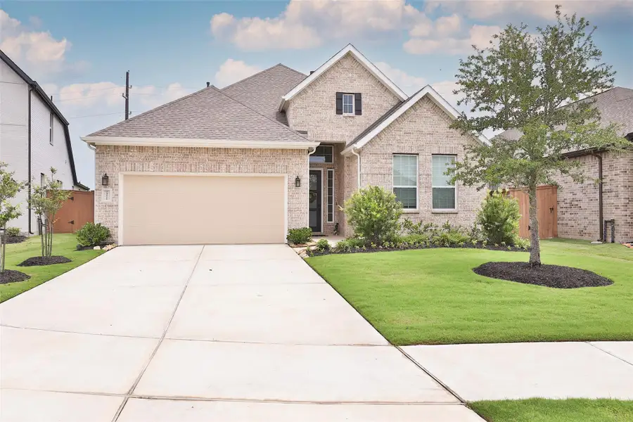 The exterior brick exudes character, seamlessly blending with the modern style as you step through the front entrance. The exterior brick exudes character, seamlessly blending with the modern style as you step through the front entrance.