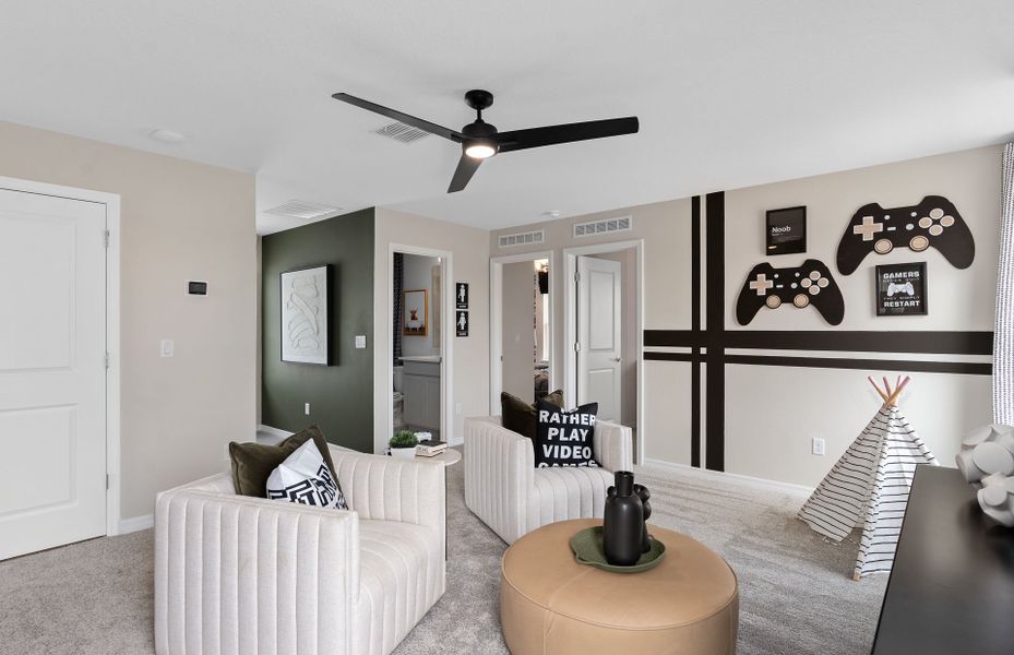 Representative furnished interior of a home built from the Landmark by Pulte Homes in Canopy Preserve, Deland (Image 6).