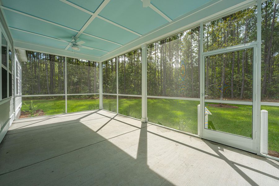 Exterior details and patio area of a home in , Awendaw (Image 24).