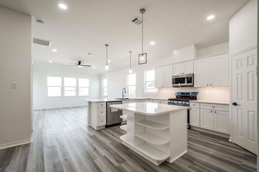 Kitchen with view of island