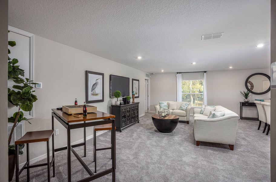 Representative furnished interior of a home built from the Orchid by Maronda Homes in Coastal Communities, Edgewater (Image 10).