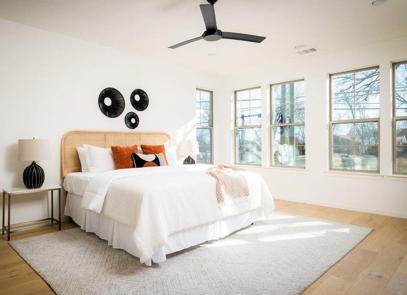 Primary bedroom is very spacious and has plenty of room for a King size bed + living area. Primary bedroom is very spacious and has plenty of room for a King size bed + living area.