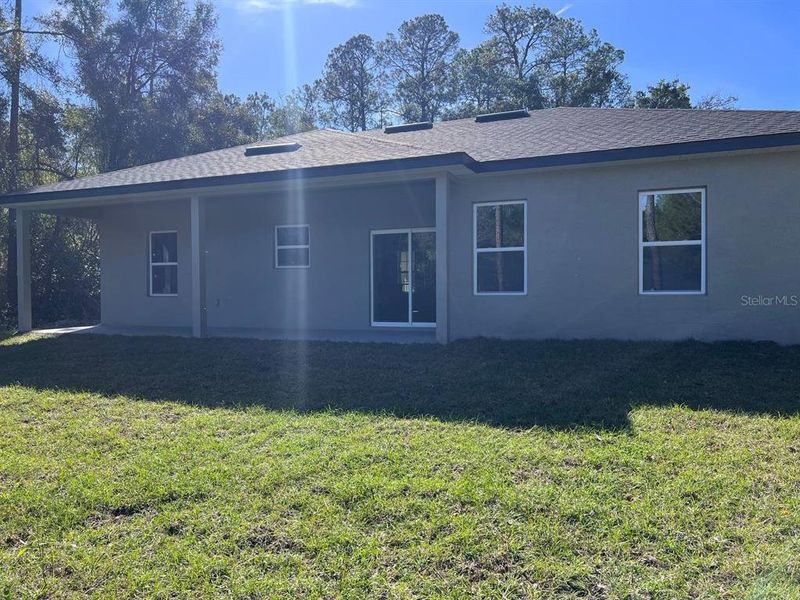 Exterior details and patio area of a home in , Citrus Springs (Image 21).