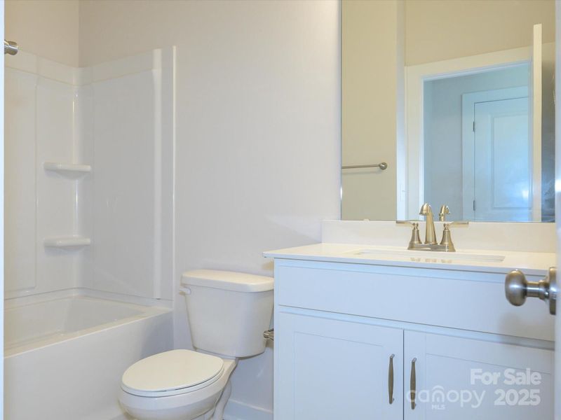 Furnished interior view inside a new home in Central Living at Craig, Charlotte (Image 9).