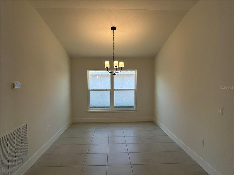 Spacious, unfurnished interior of a new home in Watercress Cove, North Port (Image 13).