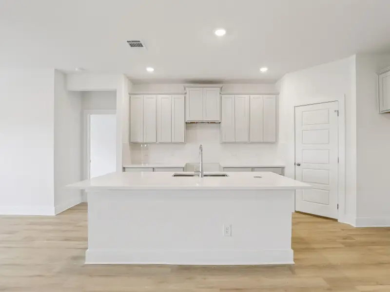 Kitchen in the Callaghan floorplan at a Meritage Homes community.