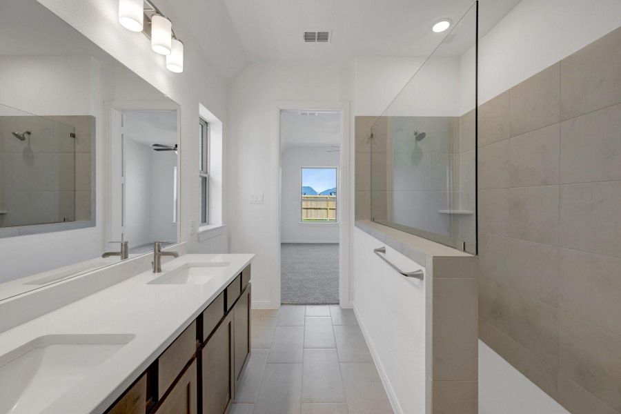 Furnished interior view inside a new home in Meridiana - Terrace Collection, Manvel (Image 5).