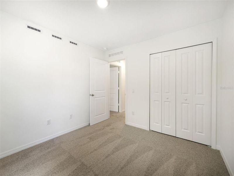 Spacious, unfurnished interior of a new home in Towns at Greenleaf, Oviedo (Image 20).