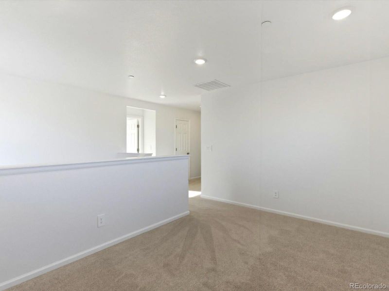 Spacious, unfurnished interior of a new home in Buffalo Highlands: The Flora Collection, Commerce City (Image 24).