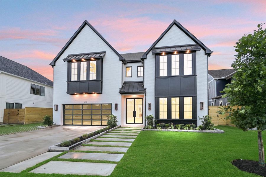 One more look! Sample of builder's previous construction. This new construction will have a similar front  elevation as pictured here with some slight modifications. Exterior colors may be different. Estimated completion spring 2026. Buyer still has time to select finishes throughout.