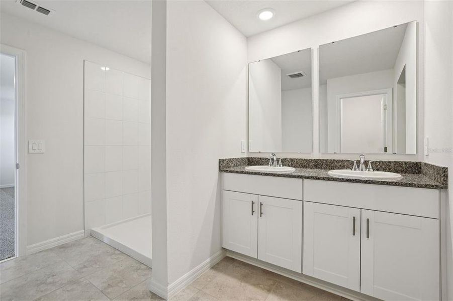 Furnished interior view inside a new home in Lake Deer Estates - Signature Series, Poinciana (Image 12).