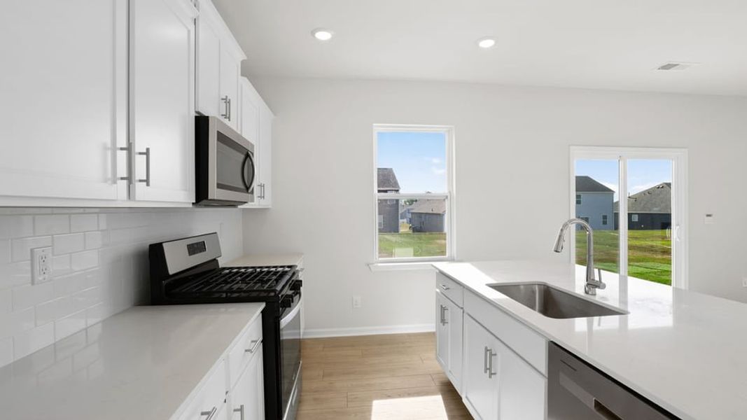 Furnished interior view inside a new home in Durbin Meadows Traditions, Fountain Inn (Image 10).