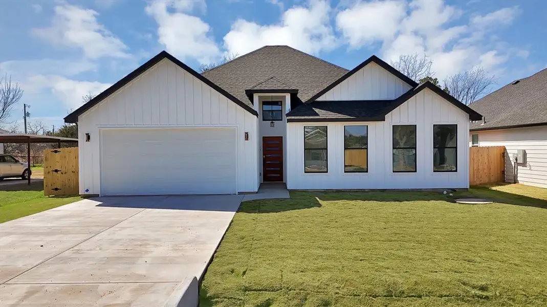 Front exterior of a new home in , Granbury, TX, highlighting curb appeal (Image 2). Front exterior of a new home in , Granbury, TX, highlighting curb appeal (Image 2).