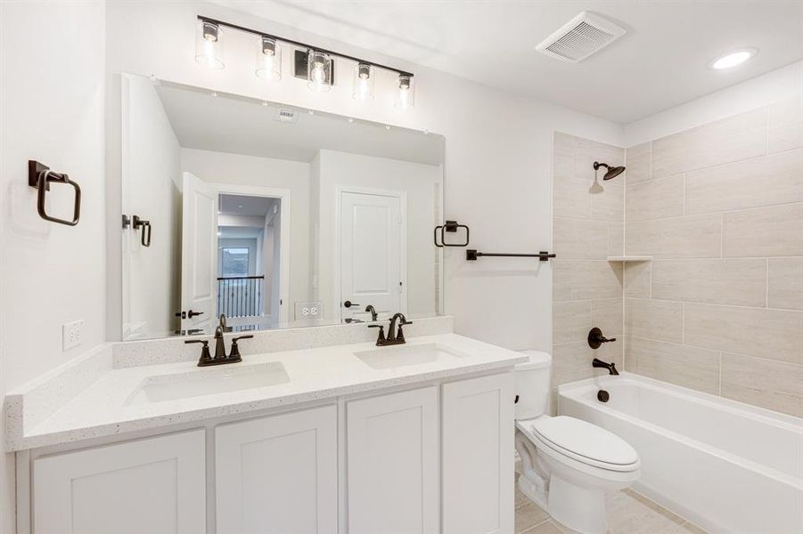 Furnished interior view inside a new home in Woodstone, Providence Village (Image 12). Furnished interior view inside a new home in Woodstone, Providence Village (Image 12).