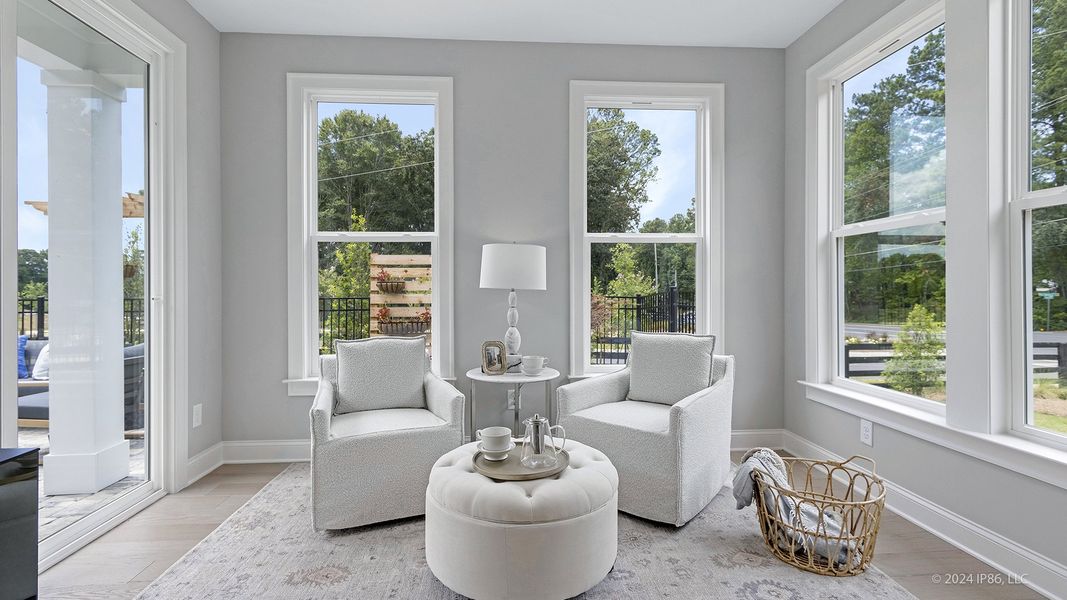 Representative furnished interior of a home built from the Portico by Epcon Communities in The Courtyards at Bailey Farms, Dacula (Image 8).