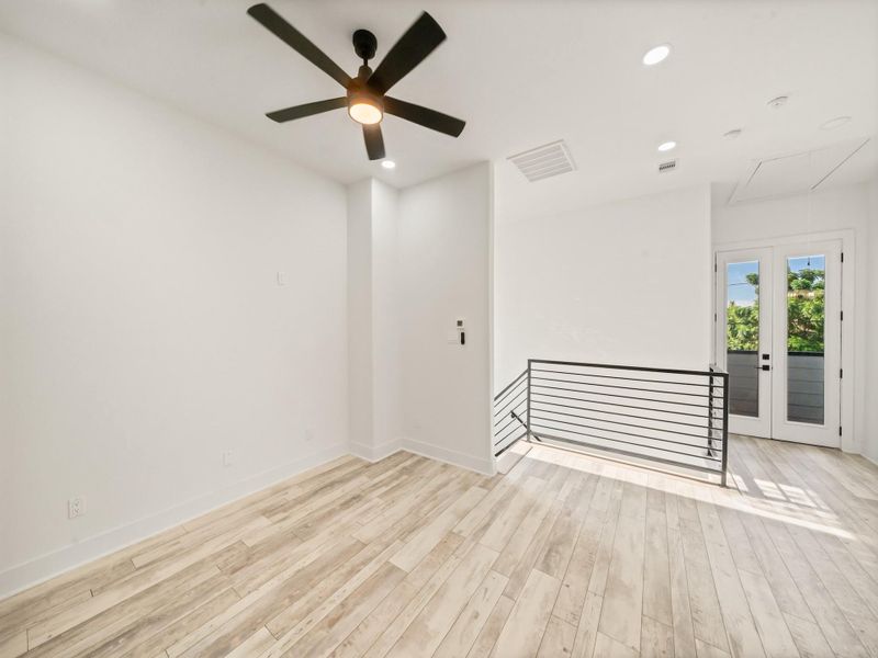 8 ft. double doors leading out to balcony.