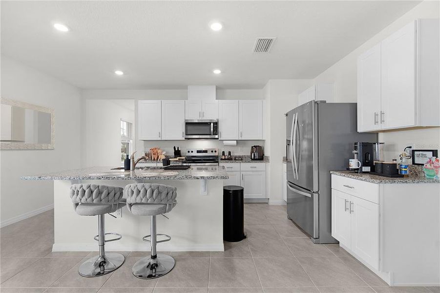 Furnished interior view inside a new home in Kindred, Kissimmee (Image 17).