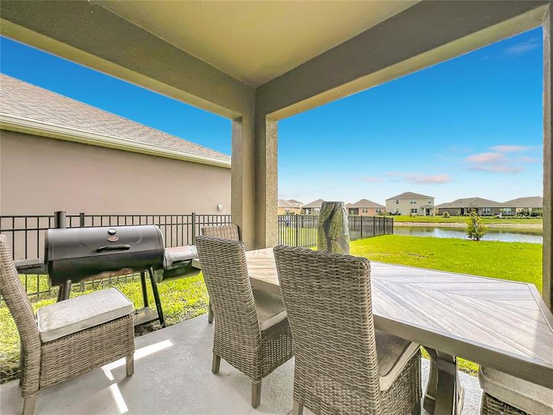 Exterior details and patio area of a home in Cypress Bay West, Palm Bay (Image 3).