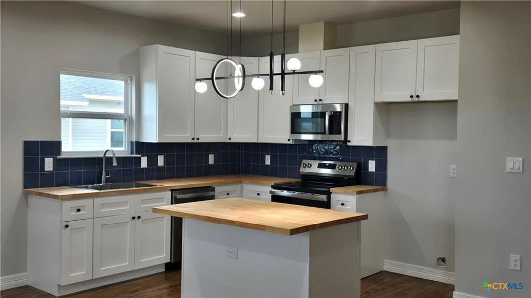 Furnished interior view inside a new home in , Port Lavaca (Image 4).