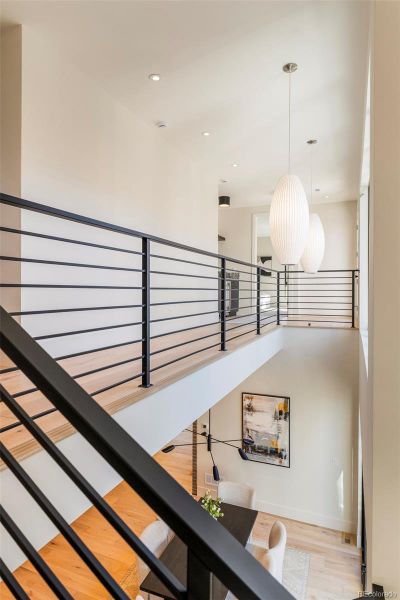 Staircase to the upper floor open to the main - allowing in a ton of natural light
