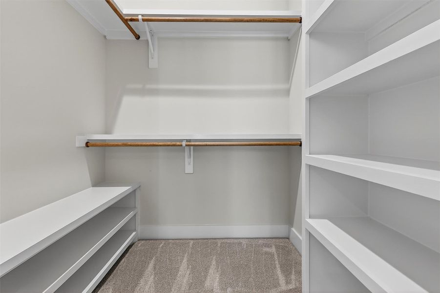 Walk-in closet with custom shelving!