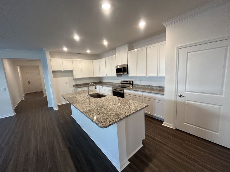 Furnished interior view inside a new home in Brookshire Green, Kingsland (Image 4).
