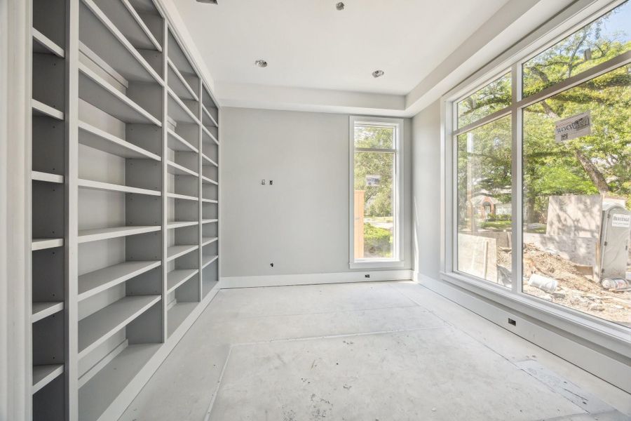 Just off the entrance of the home there is a Study.  Construction as of September 29th, 2025.