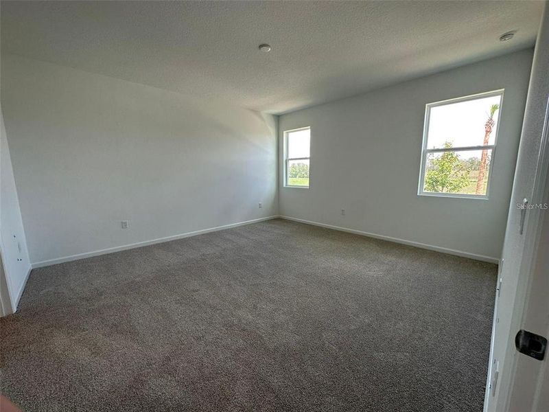 Spacious, unfurnished interior of a new home in Soleil, Kissimmee (Image 21).