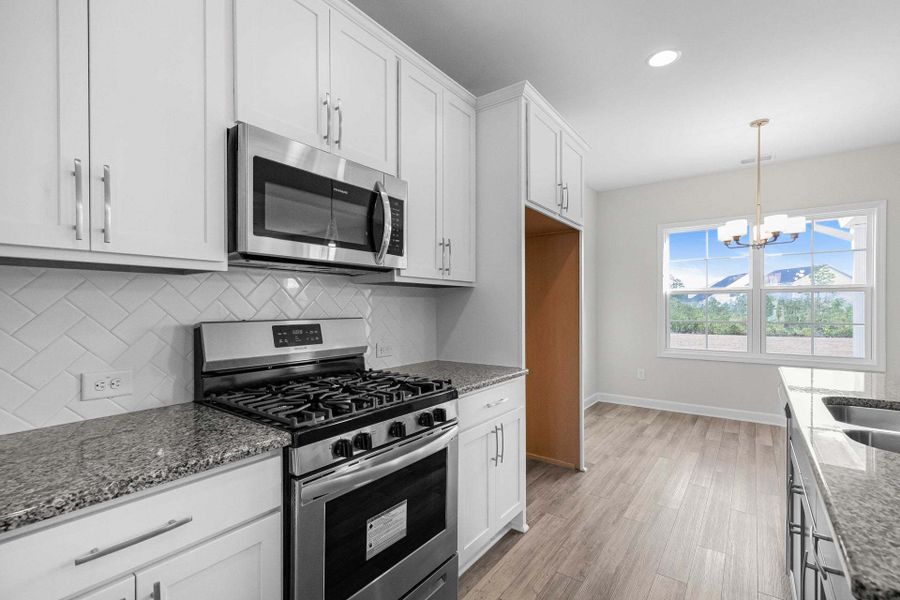 Representative furnished interior of a home built from the Clayton by Caviness & Cates Communities in Bartlett Manor, Youngsville (Image 165).