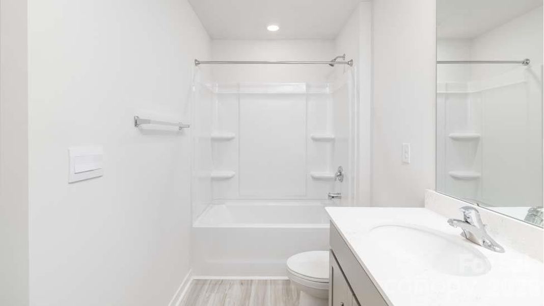 Furnished interior view inside a new home in Reedy Creek Preserve, Charlotte (Image 9).