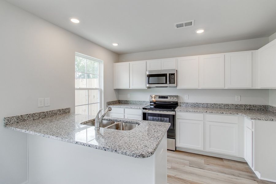 Furnished interior view inside a new home in Padgett Commons, Hopkins (Image 7).