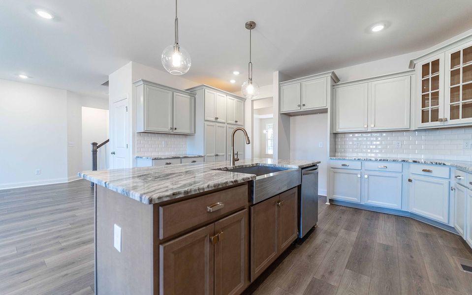 Furnished interior view inside a new home in Aden Woods, Fairview (Image 7).
