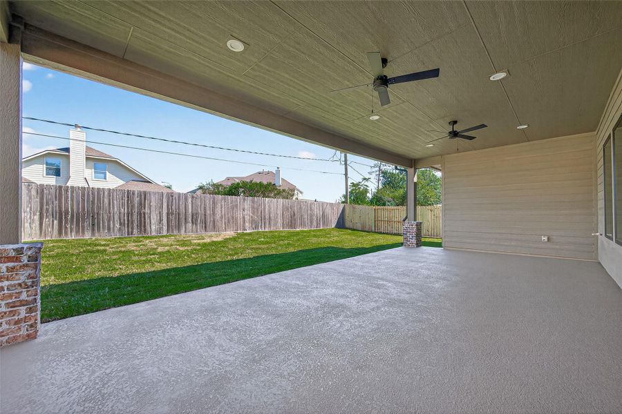 Exterior details and patio area of a home in , Tomball (Image 2).