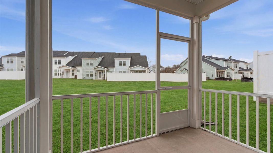 Exterior details and patio area of a home in Village at Midway, Anderson (Image 3).