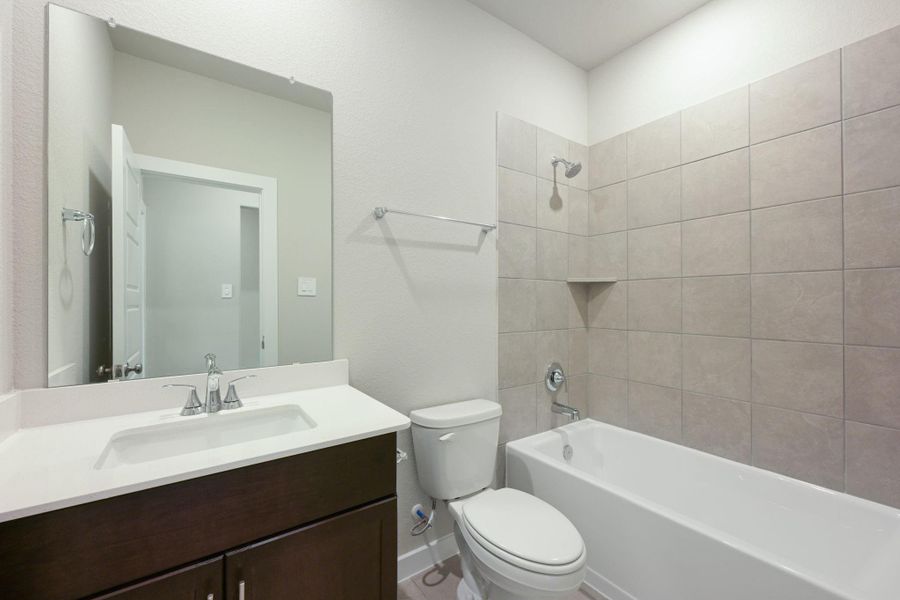 Furnished interior view inside a new home in Heights of Barbers Hill, Mont Belvieu (Image 13).