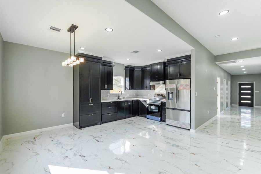 very spacious living and kitchen view