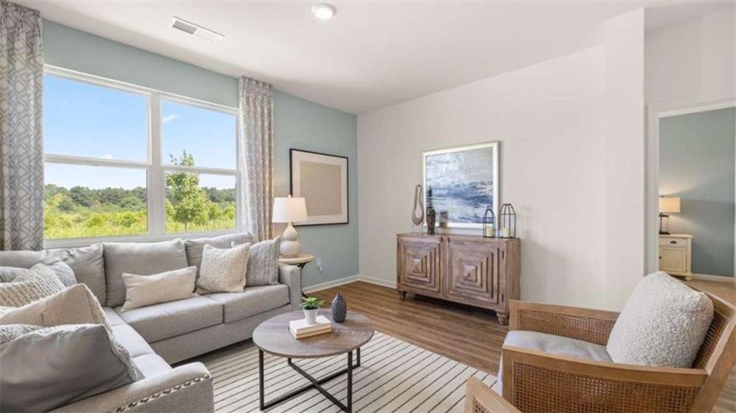 Furnished interior view inside a new home in The Preserve at Agricultural Village, Perry (Image 31).