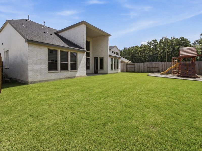 Exterior details and patio area of a home in The Trails, New Caney (Image 20). Exterior details and patio area of a home in The Trails, New Caney (Image 20).