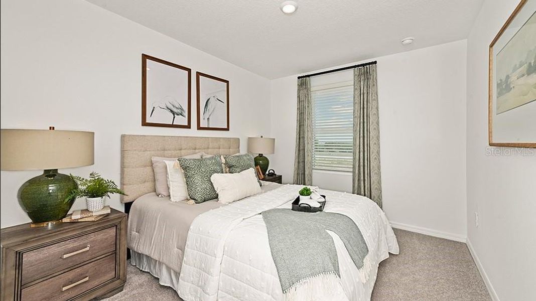 Furnished interior view inside a new home in Waterstone, Groveland (Image 14).