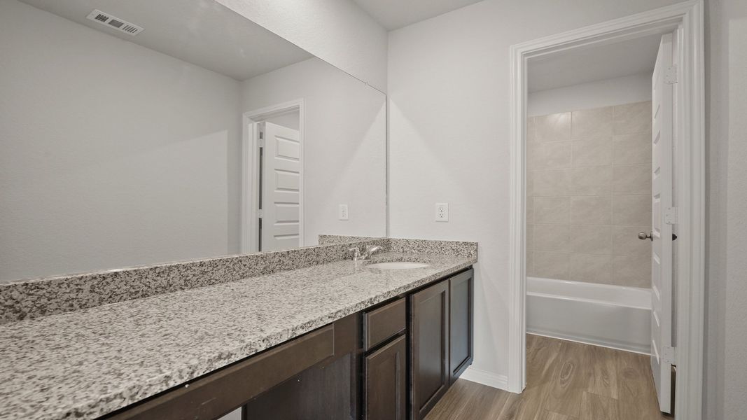 Furnished interior view inside a new home in Hunters Ranch, San Antonio (Image 8).